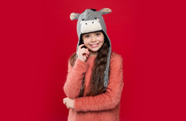 Earflap hat knitwear smiling teen child model in earflap hat teen child in earflap hat