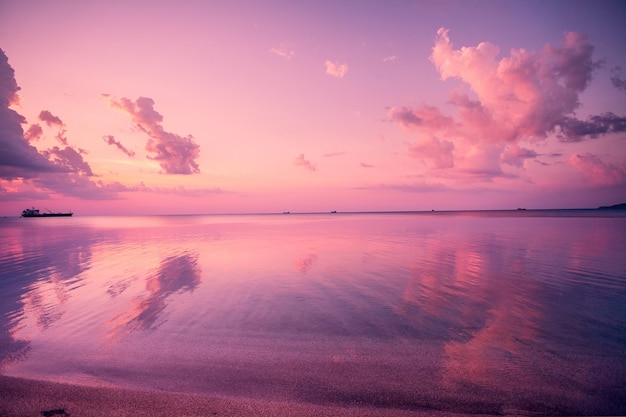 Early morning pink sunrise over sea