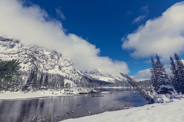 Early winter with first snow covering rocks and woods in the Glacier National Park, Montana, USA