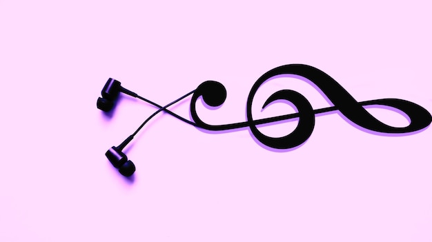 Earphones with a clef symbol. Modern music concept. Audio technology.