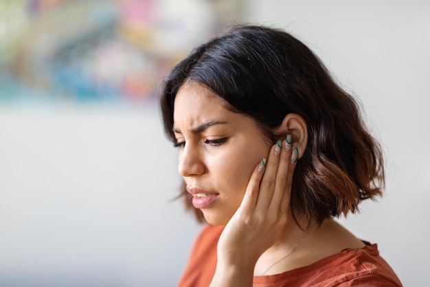 Ears Pain Sick Young Arab Woman Suffering From Earache At Home