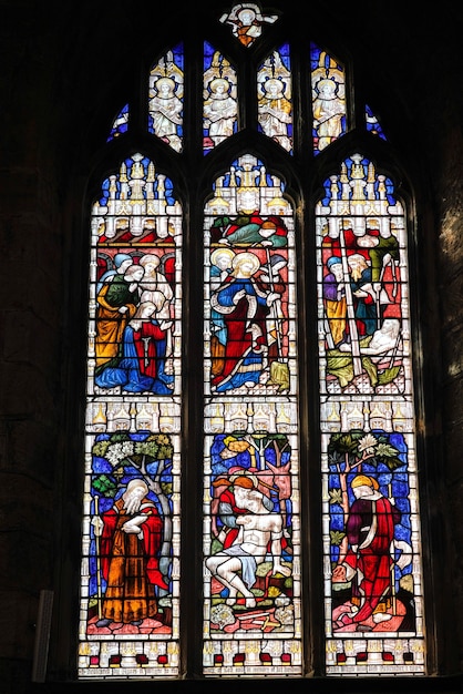 EAST GRINSTEAD,  WEST SUSSEX/UK - AUGUST 18 :  Stained glass window in St Swithun's Church  East Grinstead West Sussex on August 18, 2018