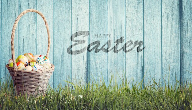 Easter background with colorful easter eggs on wooden background