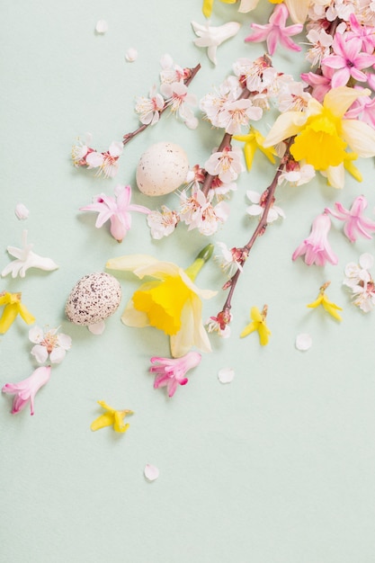 Easter background with eggs and flowers