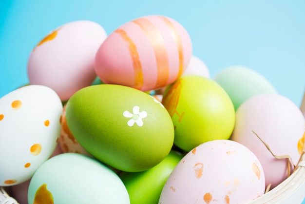 Easter basket filled with painted Easter eggs