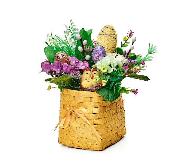 Easter basket from a flower arrangement on white background