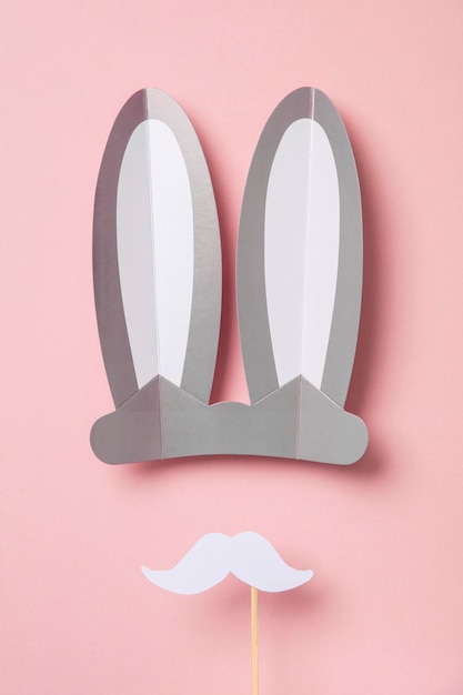 Easter bunny ears with white moustache top view flay lay easter background