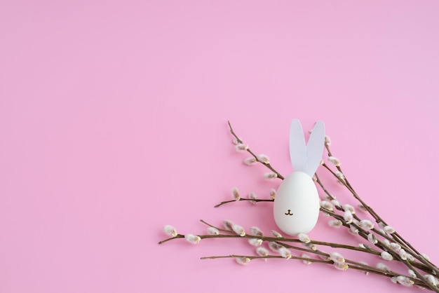 Easter bunny Easter egg pussy willow Easter holiday background Minimal creative concept copy space