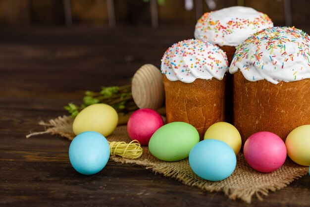 Easter cake on a brown wooden table. 