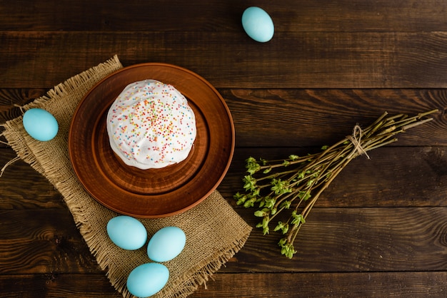 Easter, cake, eggs, holiday. Easter cake and colorful eggs on a dark background. It can be used as a background