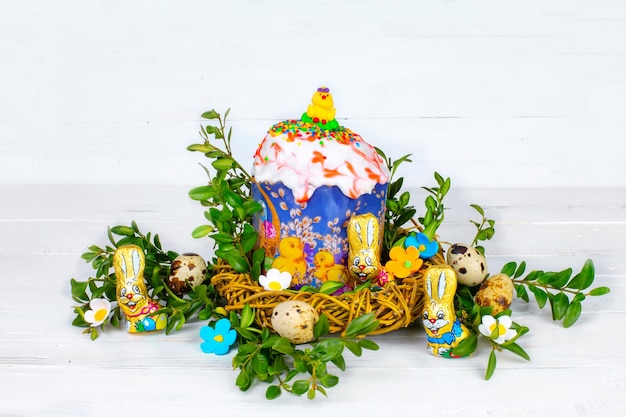 Easter cake and painted eggs white flowers festive composition in rustic orthodox tradition