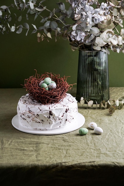 Easter cake with chocolate nest and eggs tarta mona de pasqua