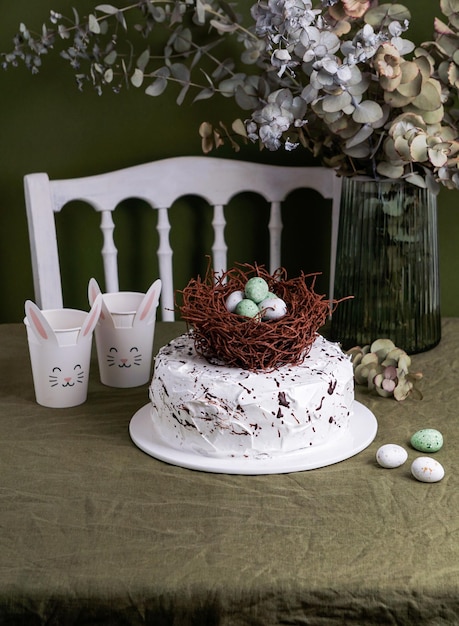 Easter cake with chocolate nest and eggs tarta mona de pasqua