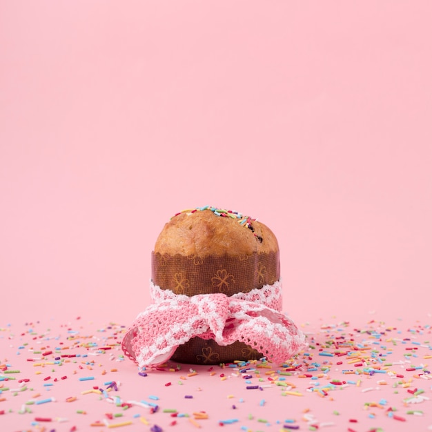 Easter cake with sprinkles on table