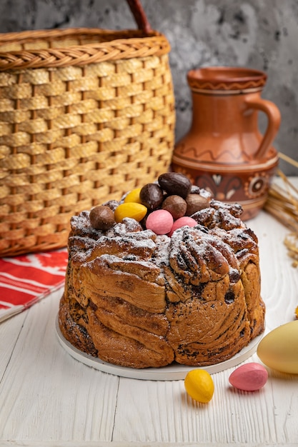 Easter cakes on a white wooden table