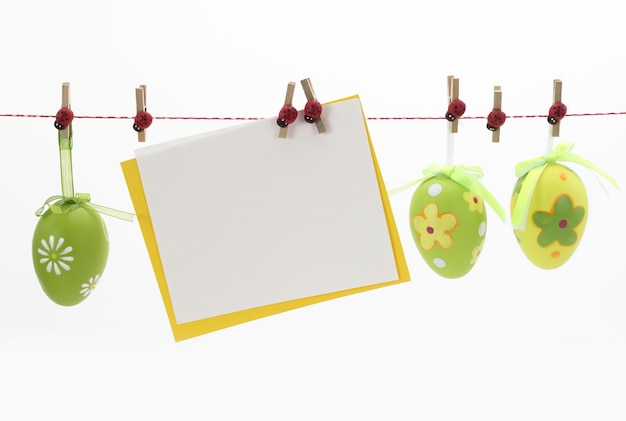 Easter card and eggs hanging on the clothesline