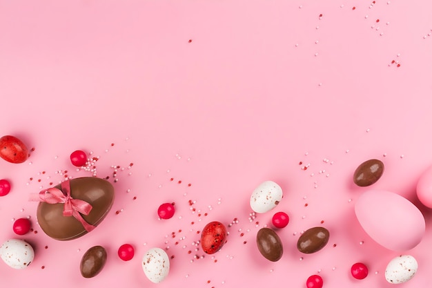 Easter chocolate eggs on pink