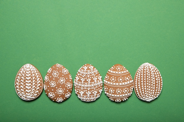 Easter cookies on a green background. Easter. Top view. Place for text.