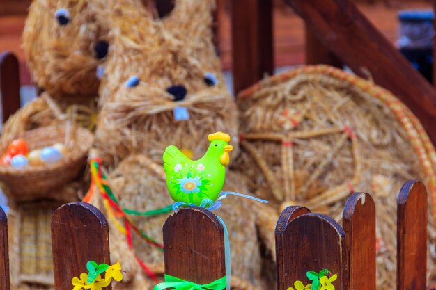 Easter decorative straw rabbit bunnies in Easter market in Prague Czech Republic