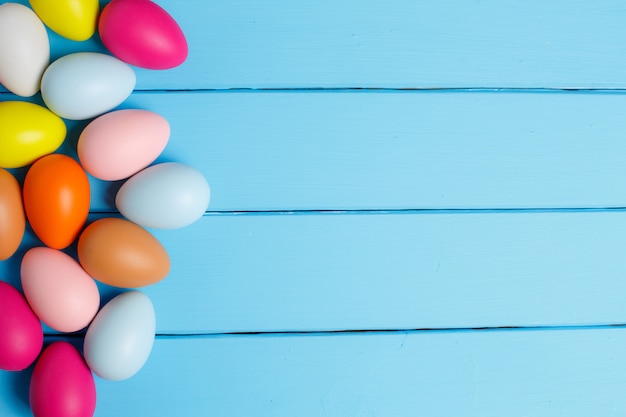 Easter eggs on blue wooden background