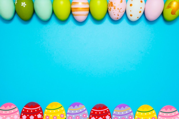 Easter eggs colorful easter eggs on blue background with copy space