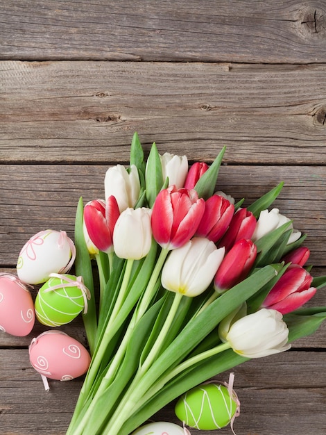 Easter eggs and colorful tulips