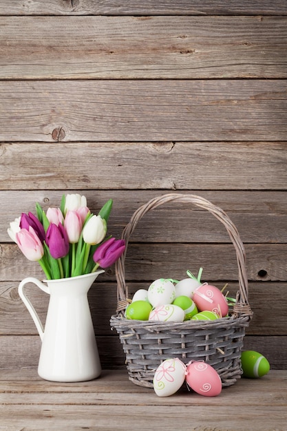 Easter eggs and colorful tulips