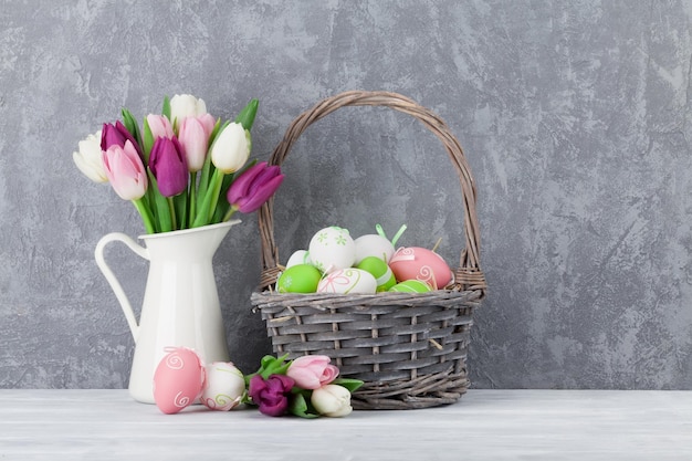 Easter eggs and colorful tulips