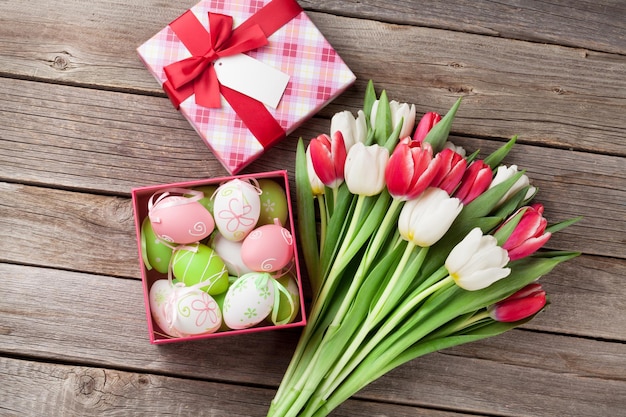 Easter eggs and colorful tulips