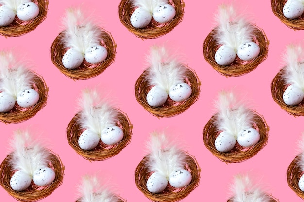 Easter eggs in a nest on a pink background. Close up seamless pattern. Easter background concept