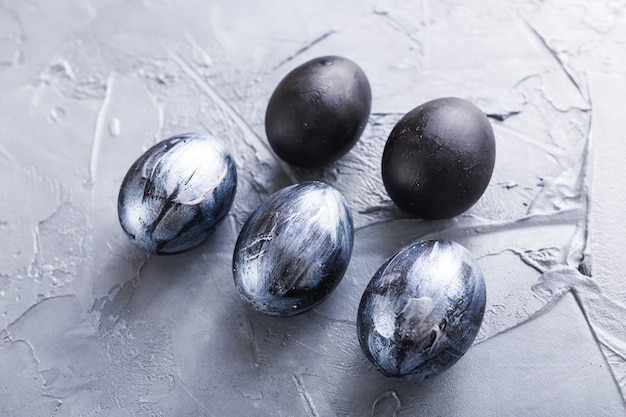 Easter eggs painted in dark colors