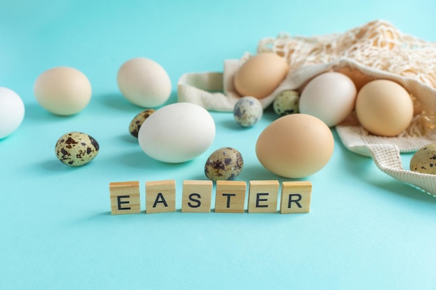 Easter eggs with natural decor Zero Waste Easter Concept Natural rustic eggs in a string bag on a blue background