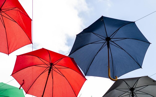 easter holiday street decoration concept colorful umbrellas against the sky city capital decoratio