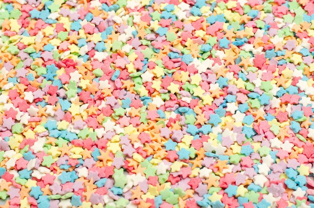 Photo easter multicolored confectionery topper background top view