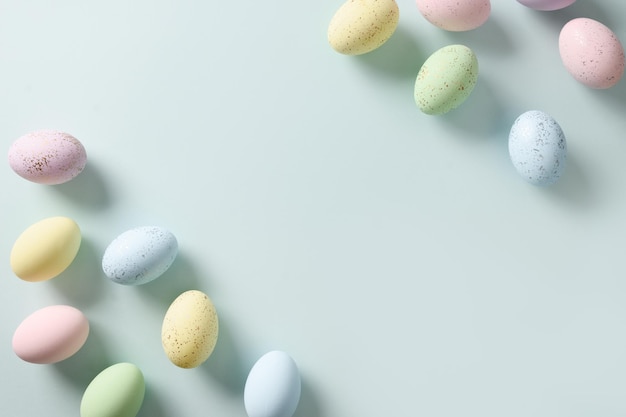 Easter pattern with pastel eggs on blue background