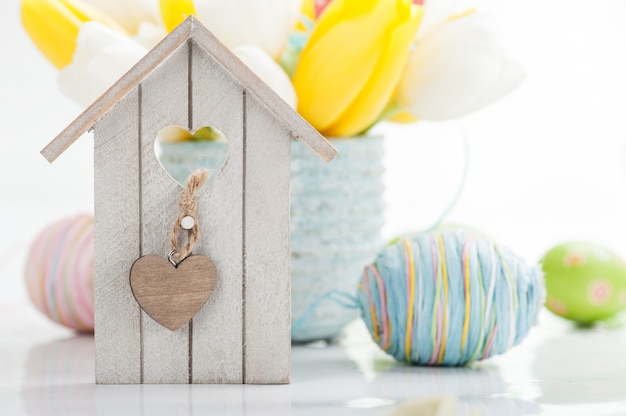 Easter still life with bird house