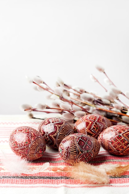 Easter still life with Pysanka on traditional Ukrainian cloth. Decorated Easter eggs, traditional for Eastern Europe culture