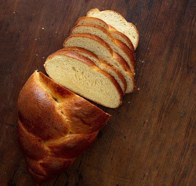 Easter sweet bread greek tsoureki braid on wooden background