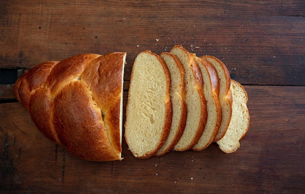 Easter sweet bread greek tsoureki braid on wooden background