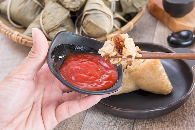 Eat zongzi (rice dumpling) on Dragon Boat Festival, Asian traditional food