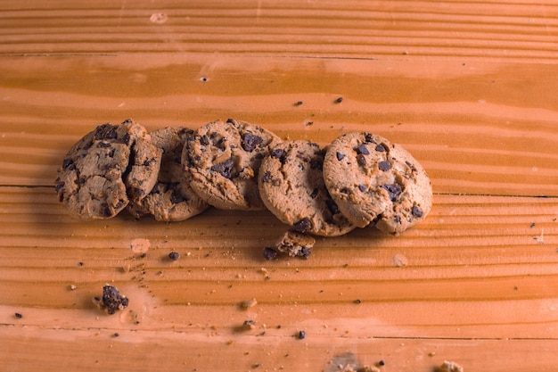 eating chocolate chip cookies while having a glass of milk