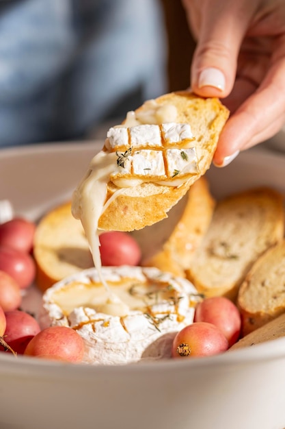 Eating naked brie cheese with bread