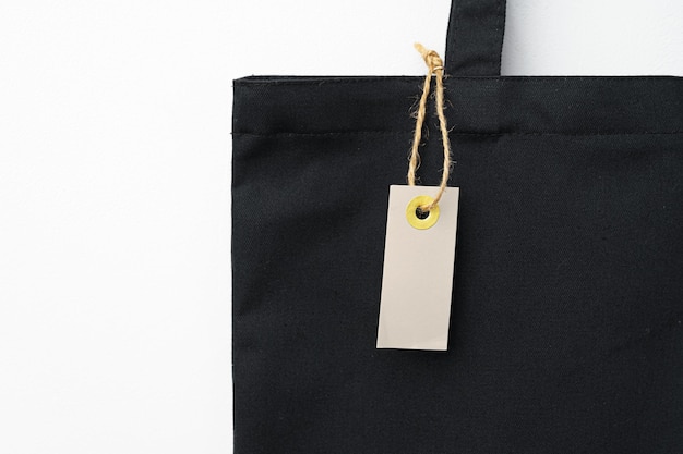 Eco bag for shopping with blank tag on white background