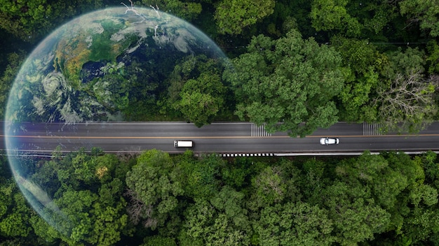 Eco car on forest road with earth planet going through forest Ecosystem ecology healthy environment road trip travel Eco car with nature Electric car and earth EV electrical energy for environment