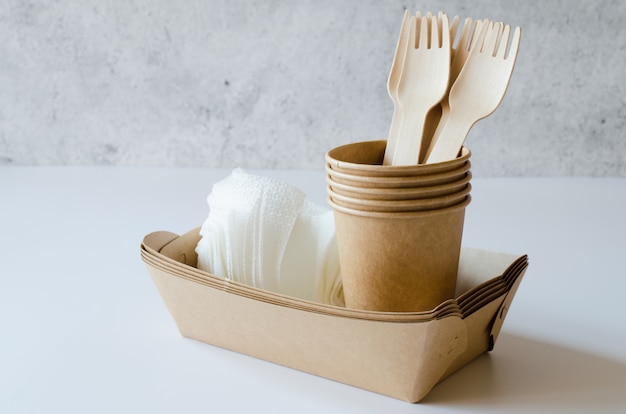 Eco-friendly biodegradable cardboard or paper dishes. Zero waste recycling concept.