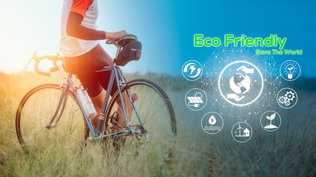 Eco Friendly concept, Green energy, carbon dioxide reduction and pollution reduction. Car free day concept to save the world and Save the earth. A man ride bicycle in midst of nature.