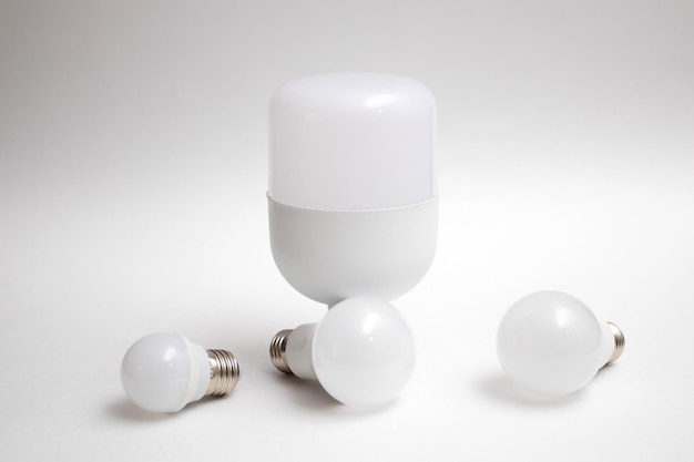 Eco friendly LED light bulbs on white background