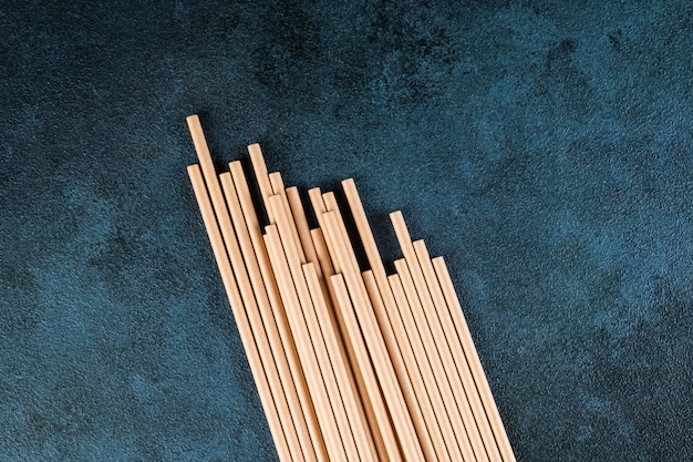 Eco friendly Reusable Straw. Paper cocktail tubes. Kraft paper straw for drinking coffee or tea. Disposable cocktail tube. Zero waste concept.