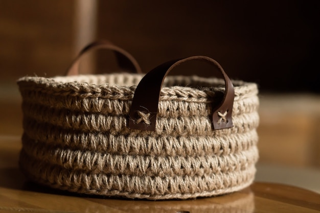 Ecofriendly basket crocheted from jute with lather handles