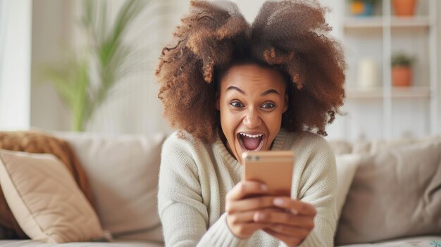 Ecstatic African American Woman Excited by Phone News